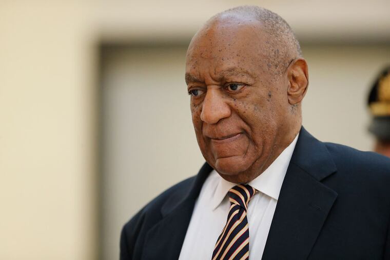 Bill Cosby walks into a courtroom inside the Montgomery County Courthouse in Norristown, PA on June 5, 2017.