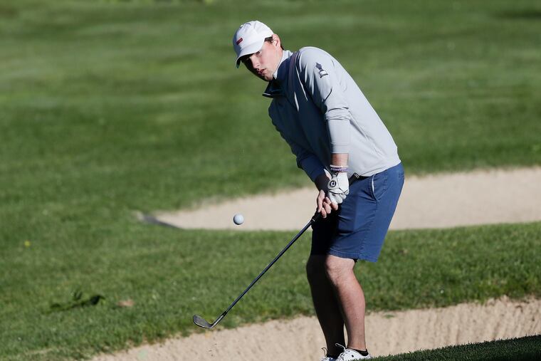 Jeremy Wall hits his chip shot on the par-4 fourth hole during the Philadelphia Amateur Championship morning match at the Stonewall Old Course in Elverson, Pa., on June 15, 2019.