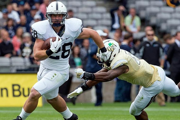 Penn State Nittany Lions Zach Zwinak (28) scrambles during the first half of the game against the Central Florida Knights at Croke Park. (Steve Flynn/USA Today)