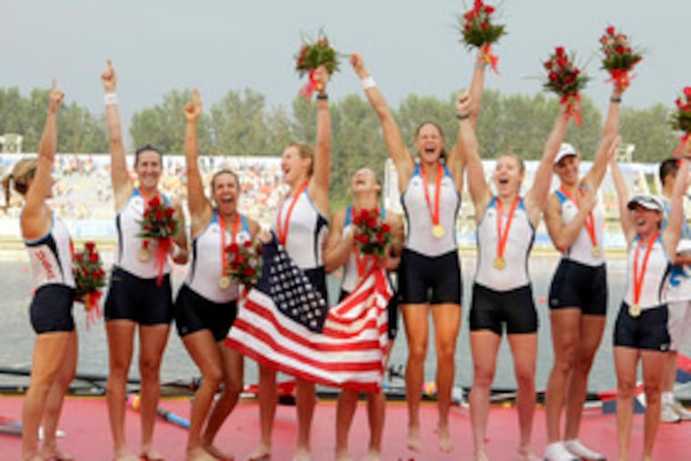 The gold-medal-winning women's eight in Beijing, Susan Francia just to the right of the American flag.