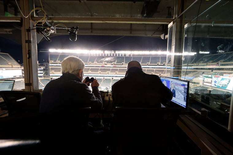 Longtime Eagles radio announcers Merrill Reese (left) and Mike Quick will be back for their 29th season together.