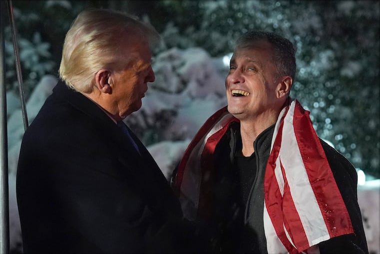 President Donald Trump greets Marc Fogel at on the South Lawn at the White House on Tuesday.