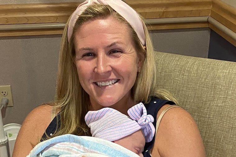 Kelly with newborn Colette.