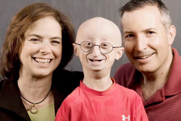 Sam Berns (center) with parents Leslie Gordon and Scott Berns.
Credit: Sean Fine/HBO