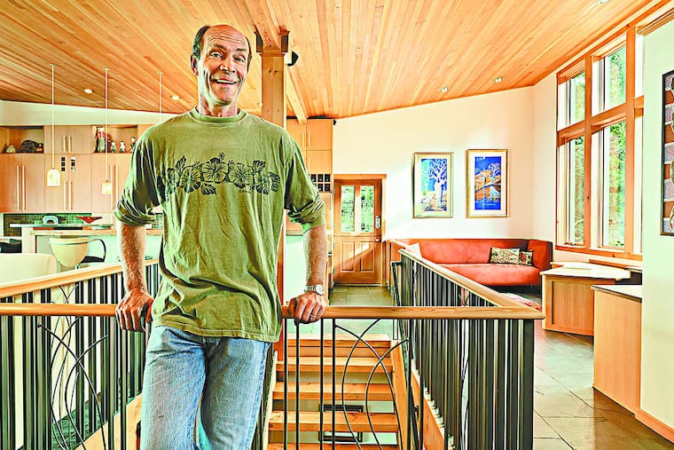 David Henderson in his Seattle home, which he and his wife, Karen, remodeled by hiring workers and finding materials on Craigslist.