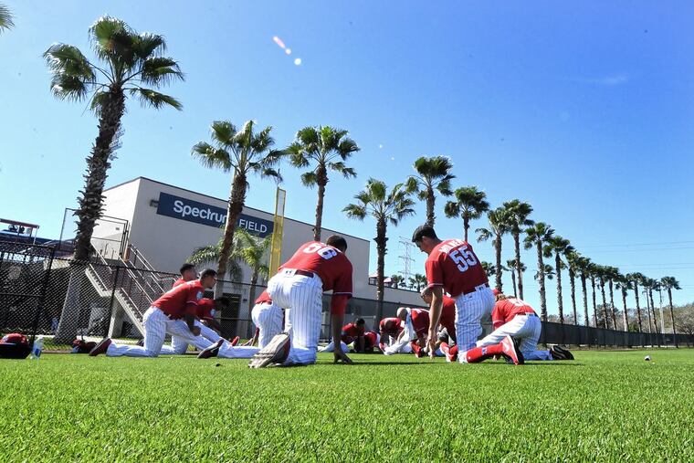Phillies pitchers stretching during spring training workouts at Spectrum Field, in Clearwater Florida. Friday, Feb. 16, 2018.