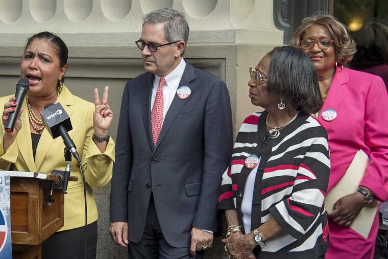 Democratic District Attorney candidate Larry Krasner is endorsed by Councilwoman Maria Quiñones Sánchez (left) former City Councilwoman Marian Tasco (second from right) and State Rep. Isabella Fitzgerald (right) outside the DA's Office May 1, 2017.
