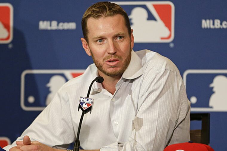 Roy Halladay announced his retirement on Monday, December 9, 2013. (John Raoux/AP)