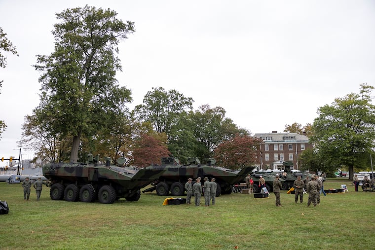 Amphibious combat and light armored vehicles on display for visitors at the Navy Yard in Philadelphia, Pa., on Saturday, Oct. 11, 2025. Military vehicles will participate in a parade on Monday Oct. 13 that will lead to street closures in Center City.