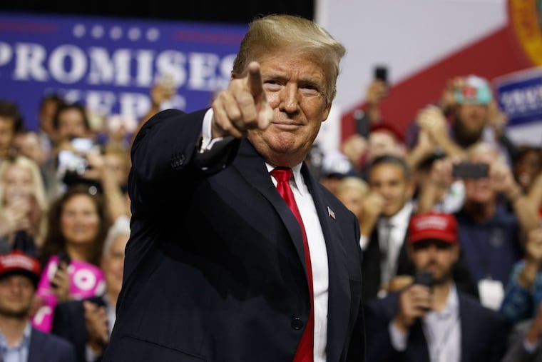 President Trump arrives for a campaign rally at Florida State Fairgrounds Expo Hall, Tuesday, July 31, 2018, in Tampa, Fla.