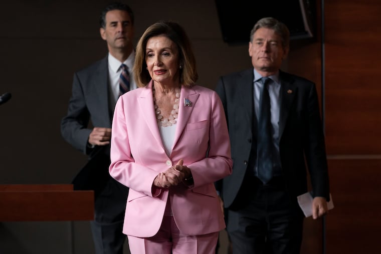 Speaker of the House Nancy Pelosi, D-Calif., joined by Rep. John Sarbanes, D-Md., left, and Rep. Tom Malinowski, D-N.J., leads House Democrats to discuss H.R. 1, The For the People Act, which passed in the House but is being held up in the Senate, at the Capitol in Washington, Friday, Sept. 27, 2019.