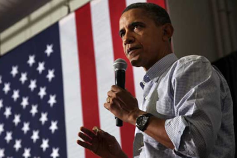 President Barack Obama campaigns for local pols at Temple University in Philadelphia on Saturday afternoon. (Laurence Kesterson / Staff Photographer)