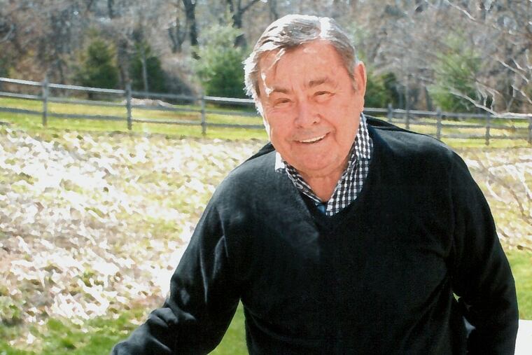 Daniel Conway Dagit in the backyard of his home in Phoenixville.