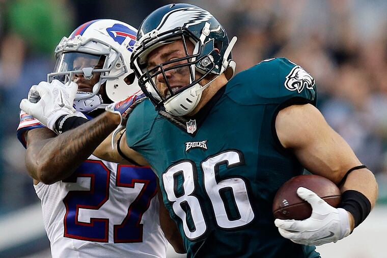Zach Ertz shoves the Bills' Duke Williams.