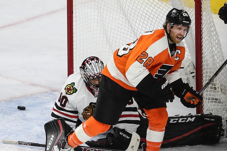 Claude Giroux celebrates his goal against the Blackhawks.