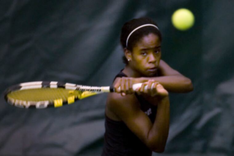 Bridges hits a backhand. She will face District 4 champion Cassie Bowman of Crestwood in the state tourney.