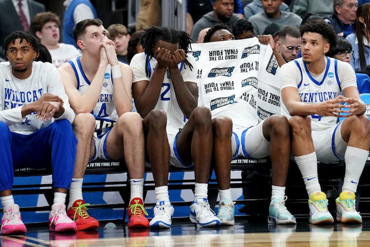 Aaron Bradshaw (center), a Camden grad, and the Kentucky bench watch on as the Wildcats are upset by No. 14 Oakland in the first-round of the NCAA Tournament.