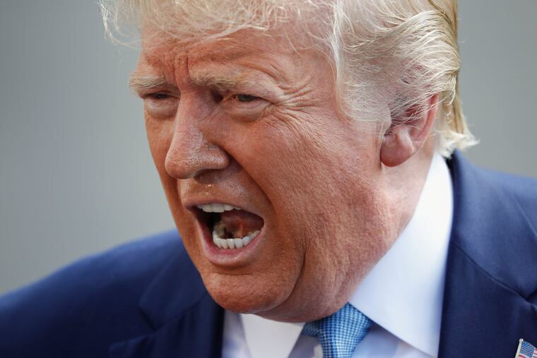 President Donald Trump speaking to the media on the South Lawn of the White House in Washington, Friday, Oct. 4, 2019, before his departure to nearby Walter Reed National Military Medical Center in Bethesda, Md.