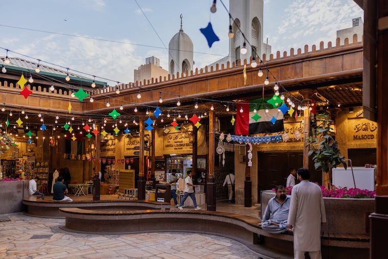 Merchants in the spice and textile souks in Deira, Dubai.