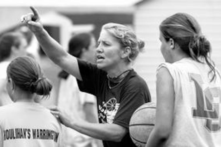 Debbie Black instructs kids at her camp. She's now an assistant coach at Ohio State University, working with mentor Jim Foster. This summer, she coached more than 200 girls at clinics.