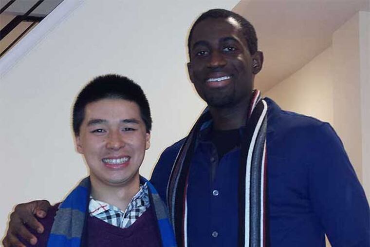 Michael Olorunnisola (right) is an entrepreneur seeking to build an education start-up. Raymond Tran is helping him with the project.