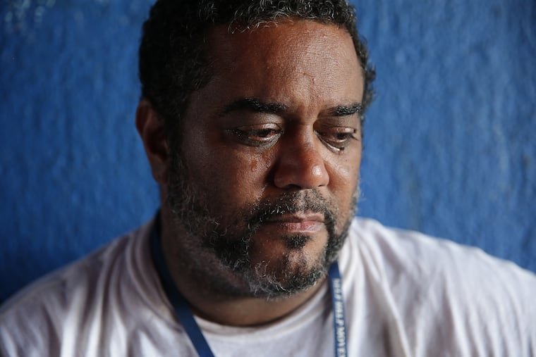 Byron Cottom, who is homeless in the Kensington section of Philadelphia, tears up as he talks about the struggles of living on the street.