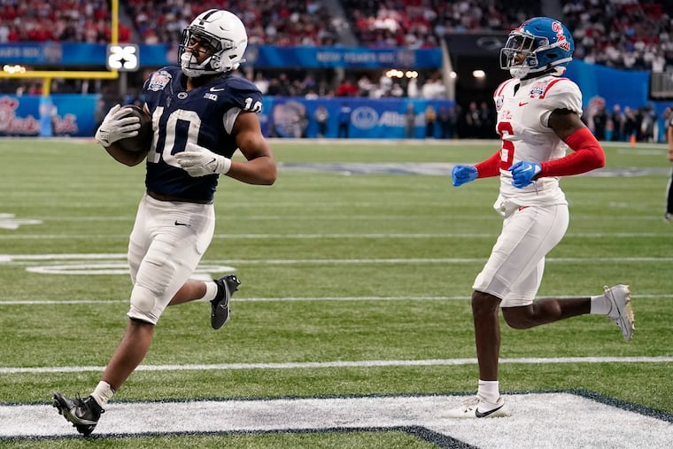 Penn State running back Nicholas Singleton (10) runs in for a second-quarter touchdown during the Peach Bowl against Ole Miss. Singleton had 136 total yards, but the Nittany Lions offense didn't complete a pass to a wide receiver until the fourth quarter in the loss.