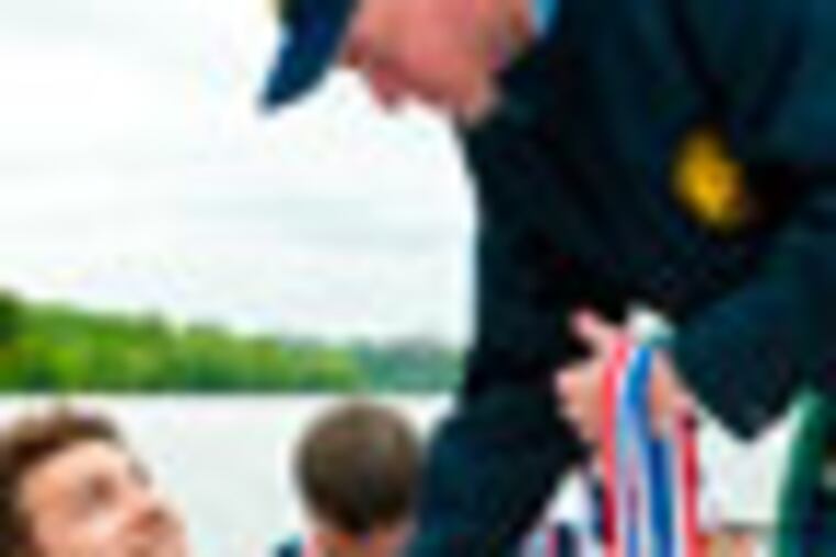 Phillydeal24. In the first picture, the gentleman in the kilt is Gary Marshall, chief executive of Aberdeen Asset Management, the Scotland-based money management firm whose US headquarters is here in Philadelphia. The pattern on the kilt is proper to the Marshall clan and related Scots families. In that first picture he’s awarding medals at last year’s Dad Vail Regatta, where Aberdeen issues the annual “Corporate Challenge†to race its own college crew alumni team against crews from Vanguard and other companies. Besides the kilt, Marshall had himself done up in blue traditional Pictish war paint (see Mel Gibson in the movie Braveheart) for the official challenge sent to other local companies.