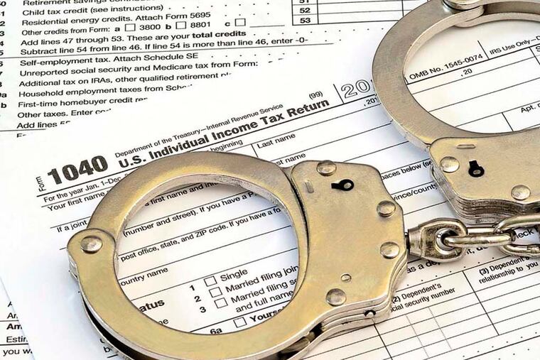 illustration for ae1invest11 on fraudulent tax filers. istock.com