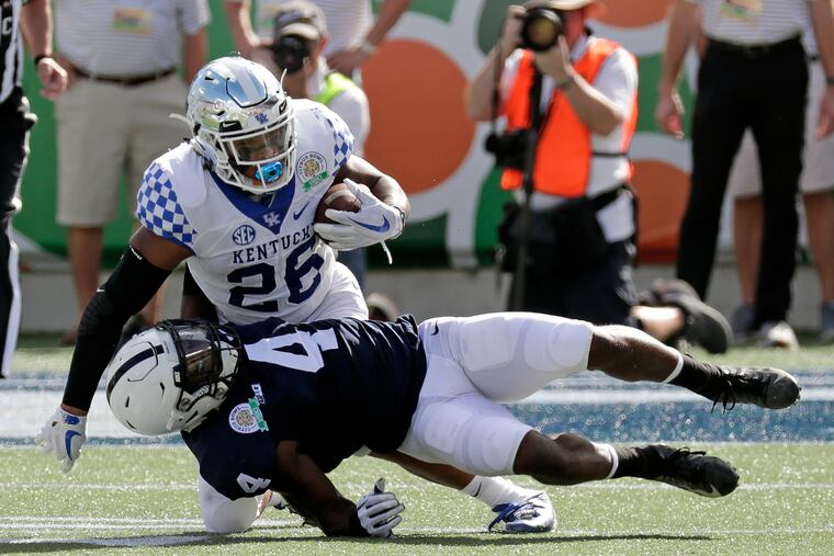 Penn State's Nick Scott stops Kentucky running back Benny Snell Jr. after a short gain in the first half of the Nittany Lions' Citrus Bowl loss in Orlando on New Years Day.