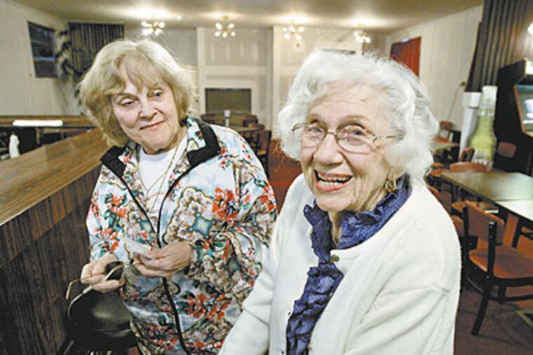 Sissy Cook, 73, (left) and her mother Kay Labricciosa, 94, at the Red Eagle Tavern on Chapel Avenue West in Cherry Hill. (Elizabeth Robertson / Staff Photographer)