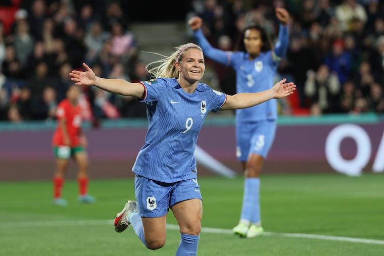 France's Eugenie Le Sommer celebrates after scoring her team's fourth goal against Morocco in Adelaide, Australia.
