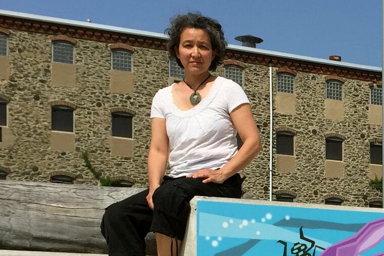 Mural artist Eurhi Jones created a 10-block trail scattered with 50 works of art inspired by nature. (DAVID McSHANE)