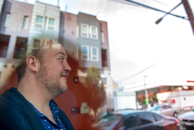 Morgan Haven-Tietze, 33, a transgender employee at the Mazzoni Center, looks outside from the center.