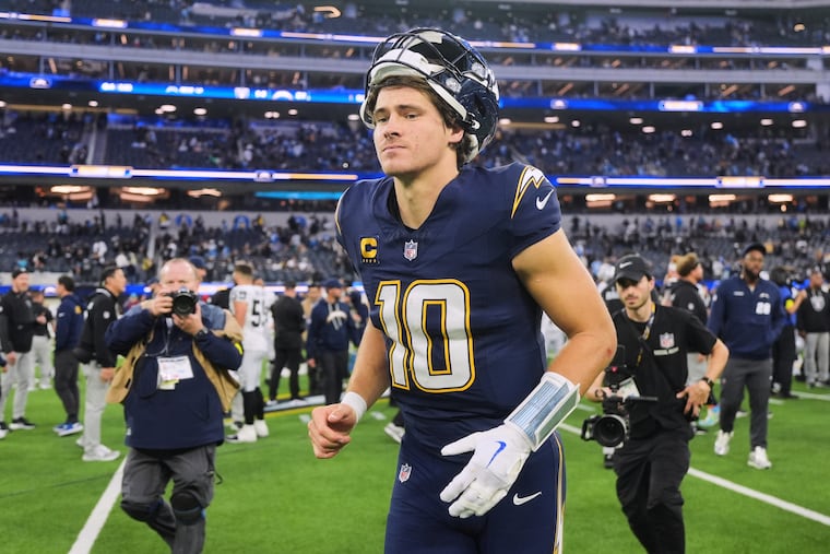 Los Angeles Chargers quarterback Justin Herbert (10) walks off the field after an NFL football game against the Las Vegas Raiders, Sunday, Nov. 30, 2025, in Inglewood, Calif. (AP Photo/Jae C. Hong)