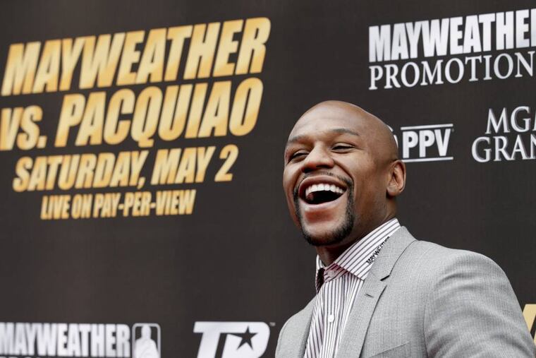 Boxer Floyd Mayweather Jr. might use a custom mouthpiece for his bout against Manny Pacquaio. (Associated Press)