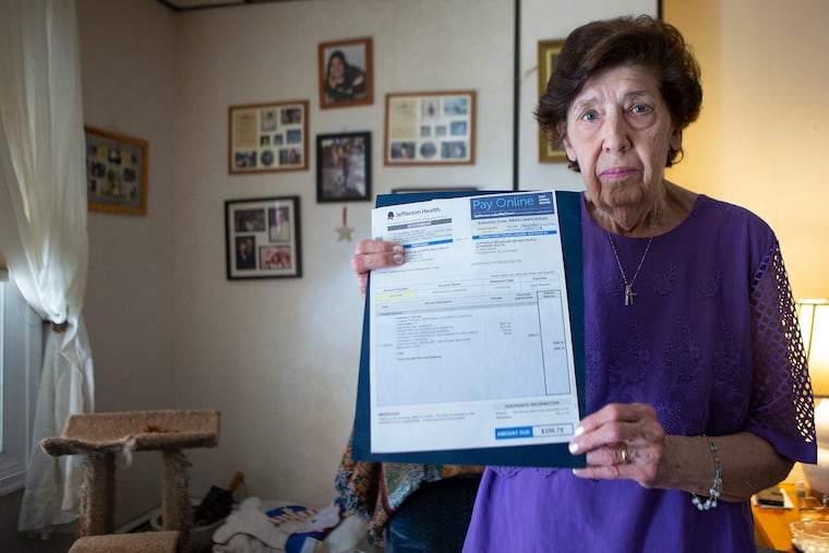 Kathy DeRosa, 80, poses for a portrait in her South Philadelphia home on Friday, June 21, 2019. DeRosa needed a cortisone shot in her shoulder for a bowling injury and had them before at her doctor's office for $10. The last shot she had at an outpatient center cost $256.