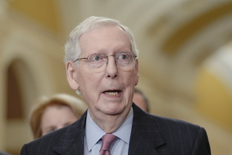 Senate Minority Leader Mitch McConnell, R-Ky., talks after a policy luncheon on Capitol Hill on Tuesday in Washington.