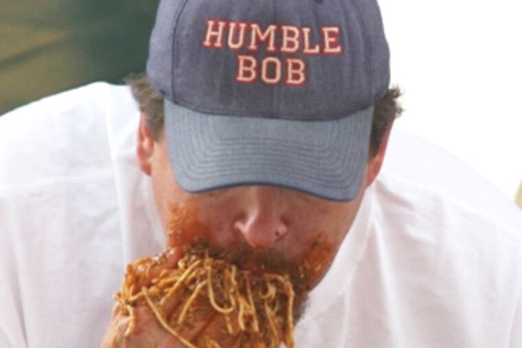 "Humble" Bob Shoudt won by cramming down 13 puonds, 9 ounches of chili spaghetti at a Cincinnati amusement park on Sept. 7, 2009.