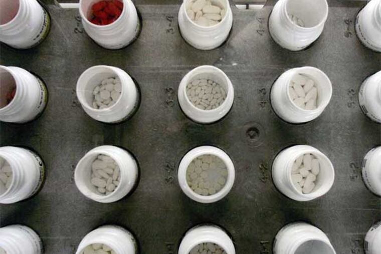 "True prices are nearly impossible to ascertain," said one academic who follows the pharmaceutical industry. (Mel Evans / Associated Press)