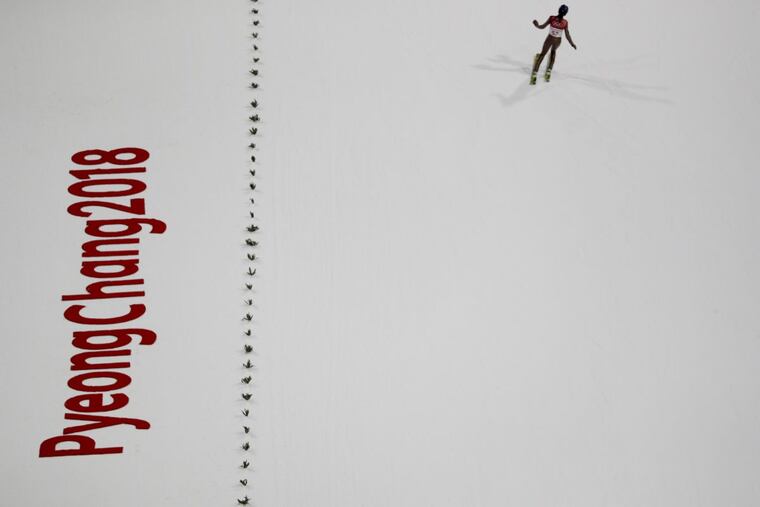 Kamil Stoch, of Poland, finishes his jump during the men’s normal hill individual ski jumping trial round for qualification ahead of the 2018 Winter Olympics in Pyeongchang, South Korea, Thursday, Feb. 8, 2018.