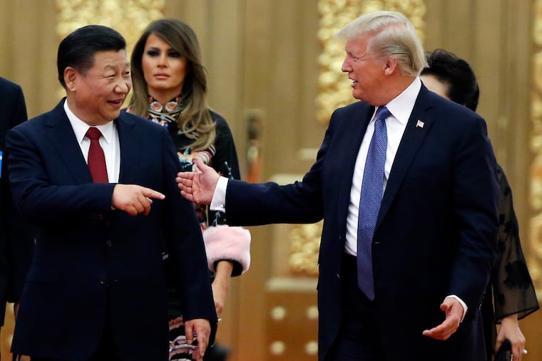 President Trump China's President Xi Jinping arrive for the state dinner with the first ladies at the Great Hall of the People in Beijing, China.