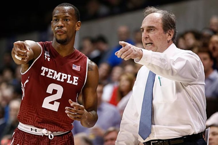 Temple's head coach Fran Dunphy gestures as he talks with Will Cummings (2) during the second half of an NCAA basketball game against SMU, Thursday, Feb. 19, 2015, in Dallas. SMU won 67-58. (Jim Cowsert/AP)