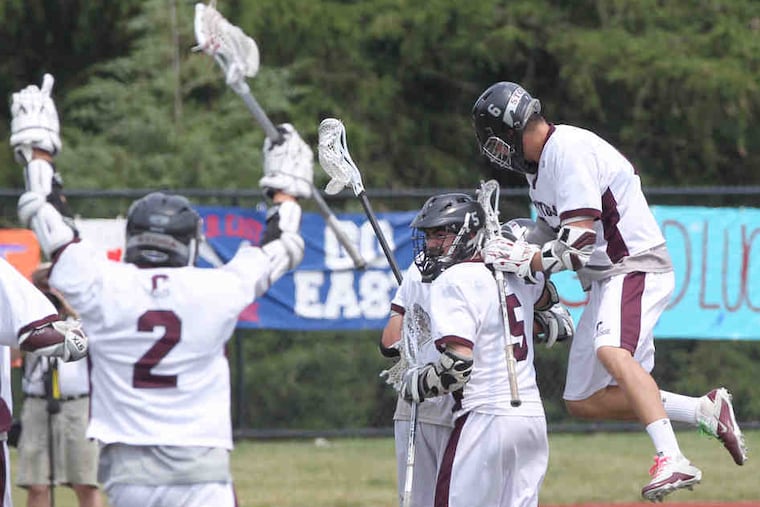 Conestoga players celebrate a goal in the final seconds of the second quarter that gave them an 8-0 lead. The Pioneers went on to defeat Central Bucks East, 14-4, in the state semifinals.