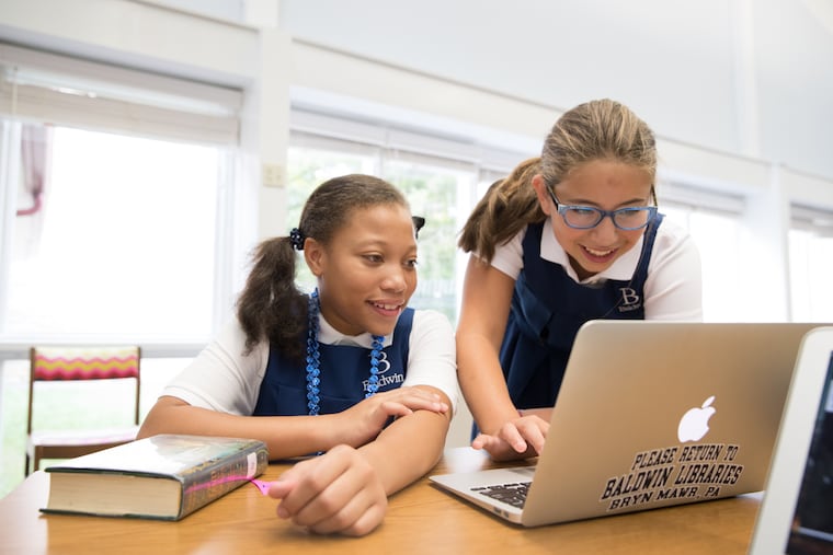 Baldwin Lower School students collaborating on a technology project.
