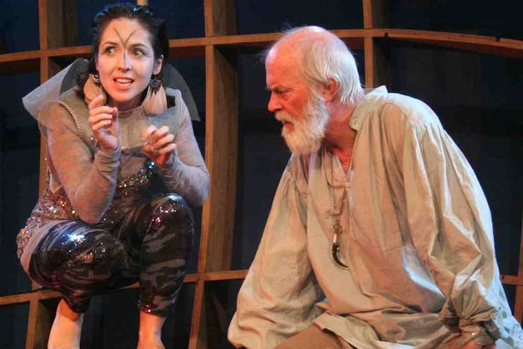 Sarah Doherty, as Ariel, at left, relates how she caused a shipwreck to her master, Prospero (Dan Kern), in "The Tempest." Kern is appropriately authoritative but never overbearing. At right, the young lovers, Miranda (Nicole Erb), Prospero's daughter, and Ferdinand (Griffin Stanton-Ameisen) embrace.