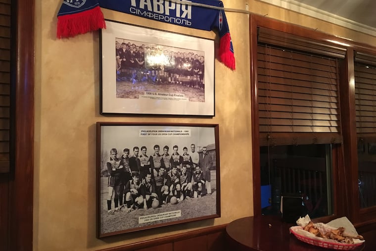 The Ukrainian Nationals' clubhouse in North Wales is filled with historic memorabilia from the team's glory years, including these photos from championship teams in the 1950s and 1960s.