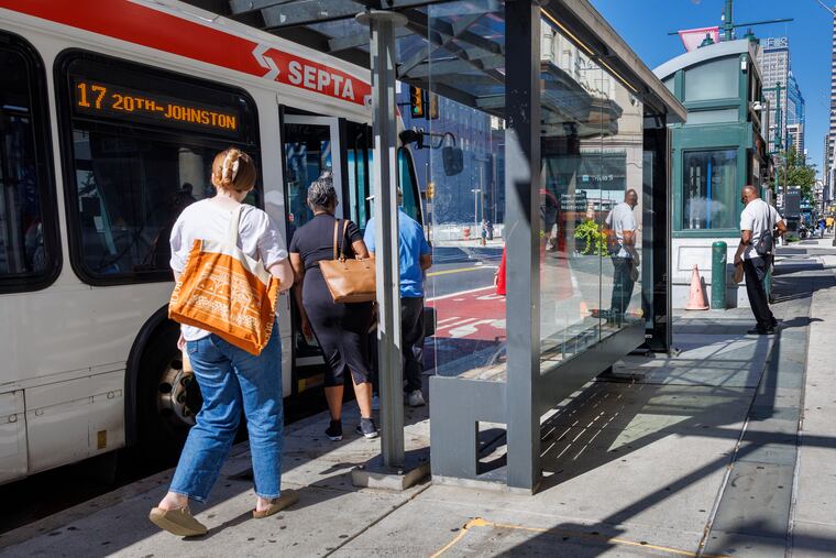 Riders on the SEPTA Route 17 bus board at Market and Ninth Streets in Center City Philadelphia, Tuesday, Aug. 26, 2025.
