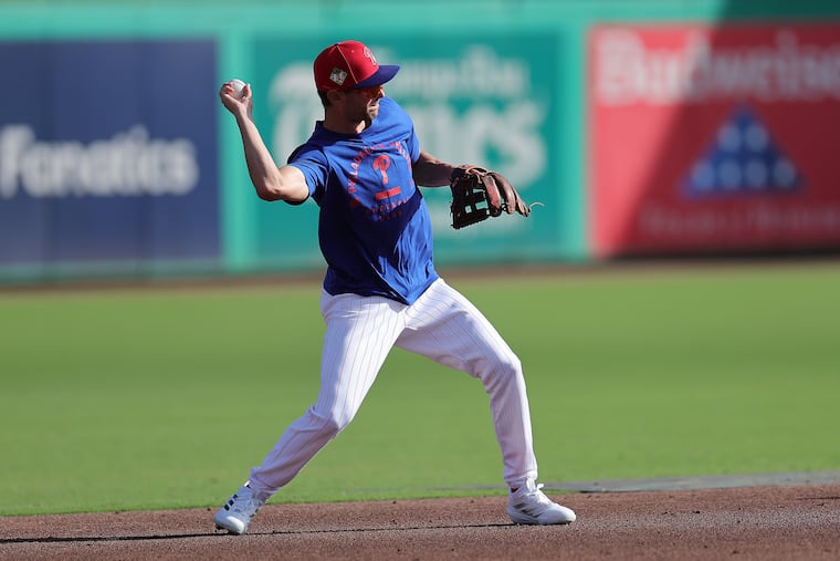 Phillies shortstop Trea Turner throws to second base during a spring training workout on Wednesday in Clearwater, Fla.
