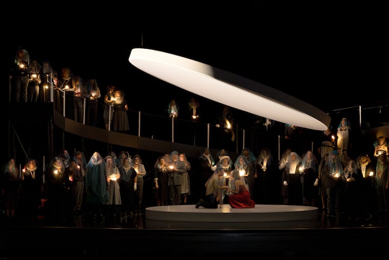 Jonghyun Park (The Stranger) and Susanne Burgess (Thorn Rose) surrounded by courtiers, workers, and townspeople in Gregory Spears’ "Sleepers Awake"